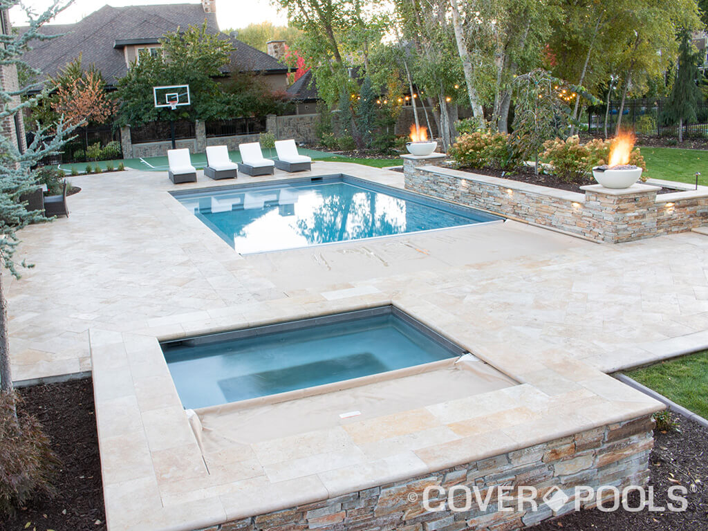 tan automatic pool and spa cover fire feature